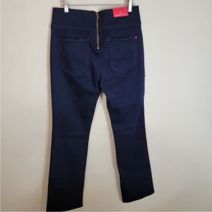 New with tags, Boot Cut Spanx size 30, dark wash.